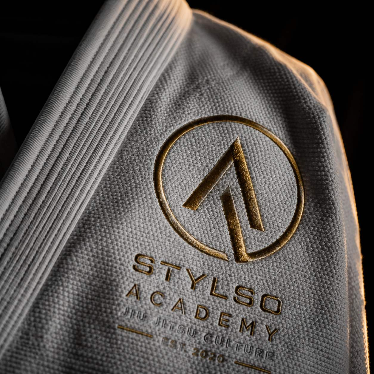 Custom academy logo embroidery on a Stylso gi