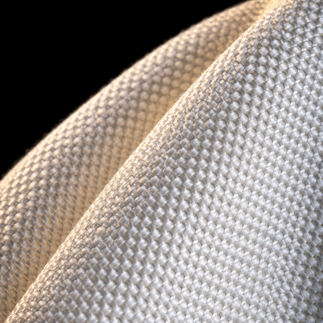 Stylso pearl-weave BJJ gi fabric close-up — the dense weave that traps bacteria when care habits fall short
