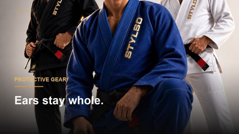 BJJ athlete grappling on the mat — wearing proper ear protection prevents cauliflower ear during rolling