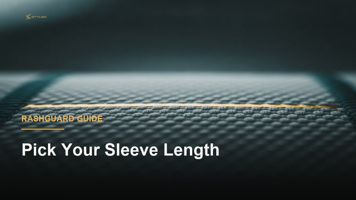 Close-up macro texture of a BJJ rashguard fabric under dramatic gold-toned studio lighting, showing compression weave detail